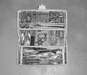 My compact tool kit, which has held me in good stead for over 20 years, includes electrical crimps and ties, and various SS screws, nuts and bolts (top middle), spark plugs (middle left), D shackle and impeller (middle), and fuses and light bulbs (middle 